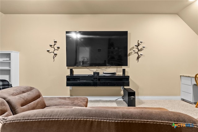 living room featuring light colored carpet and vaulted ceiling