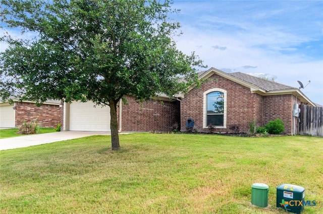 1617 Shadow Canyon Dr, Temple, TX 76502 - view of front of home with brick siding, a garage, and driveway