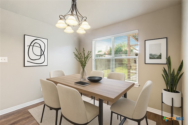 1617 Shadow Canyon Dr, Temple, TX 76502 - dining space with dark wood-style floors and a chandelier