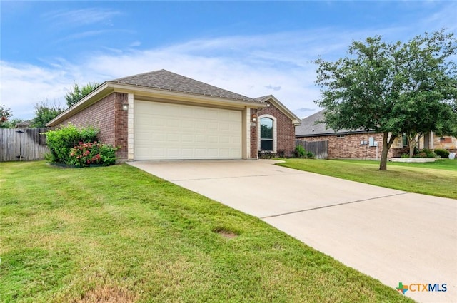 1617 Shadow Canyon Dr, Temple, TX 76502 - ranch-style home featuring brick siding, an attached garage, driveway, and a shingled roof