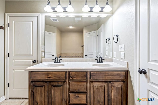 1617 Shadow Canyon Dr, Temple, TX 76502 - full bath featuring double vanity and tile patterned floors