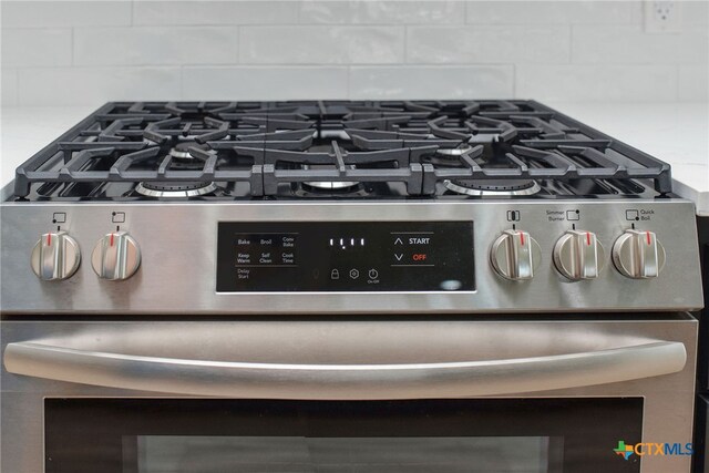 room details featuring stainless steel range with gas cooktop