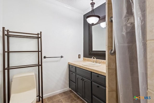 full bath featuring tile patterned flooring, baseboards, toilet, ornamental molding, and vanity