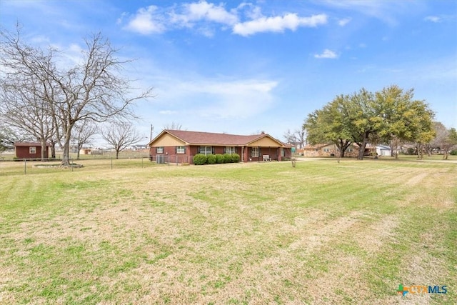 view of yard with fence