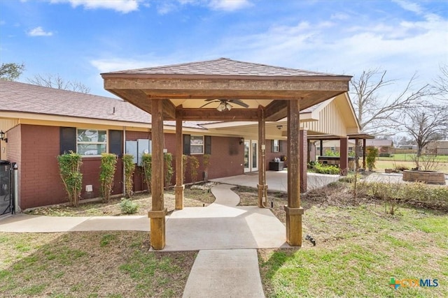 exterior space featuring a patio area and fence