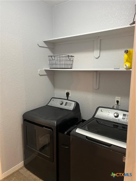 laundry area featuring separate washer and dryer