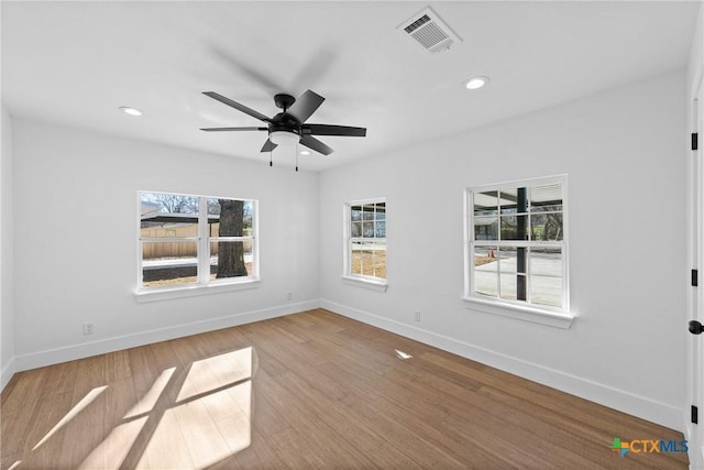 unfurnished room with light hardwood / wood-style flooring and ceiling fan