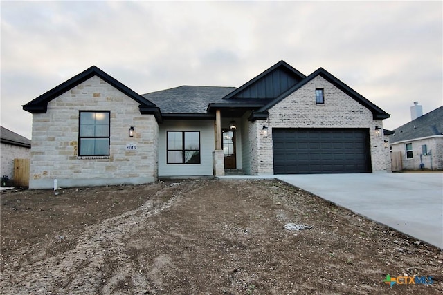 view of front of property featuring a garage