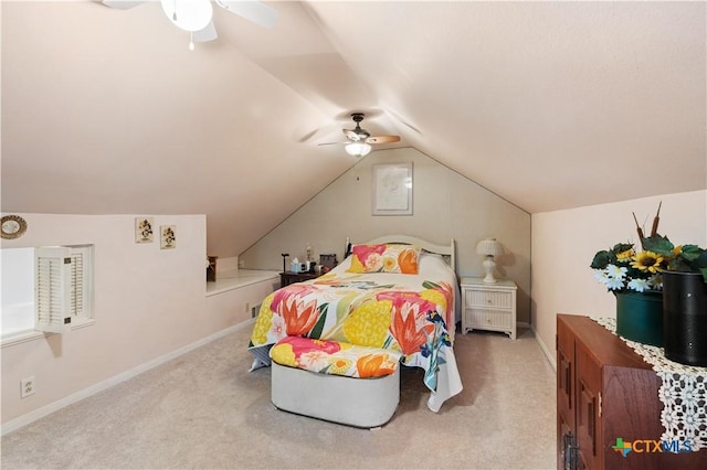 bedroom with lofted ceiling, baseboards, a ceiling fan, and light colored carpet