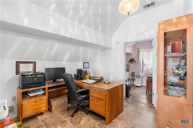 office area with lofted ceiling and visible vents