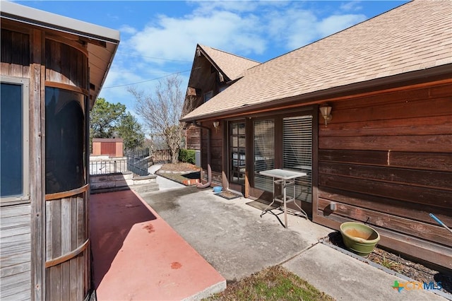 view of patio with fence