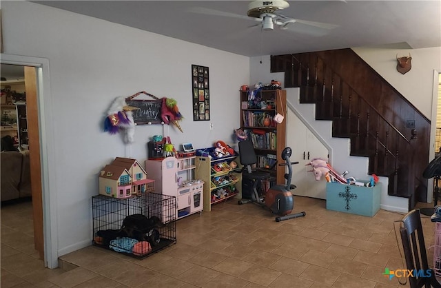 interior space featuring ceiling fan