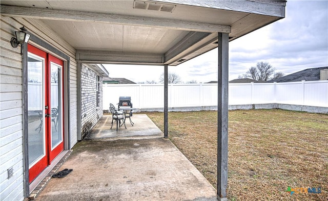 view of patio / terrace featuring a fenced backyard and visible vents