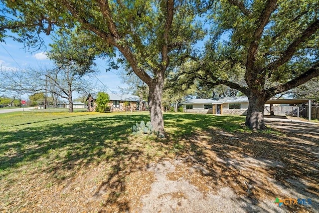 512 W Pecan Dr, Johnson City, TX 78636 - view of front of house featuring a front yard