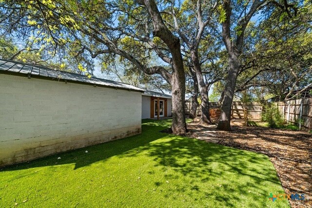 512 W Pecan Dr, Johnson City, TX 78636 - view of yard with french doors