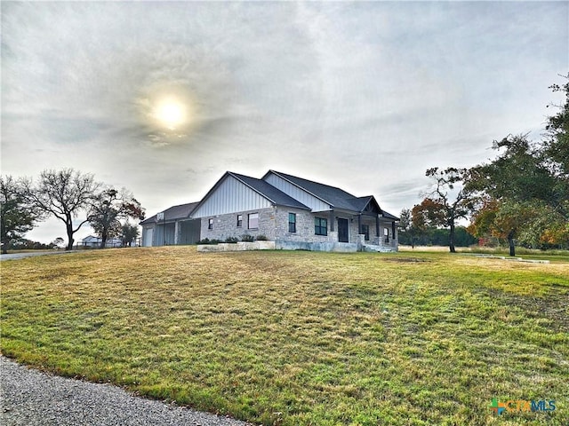 view of front of home with a front yard