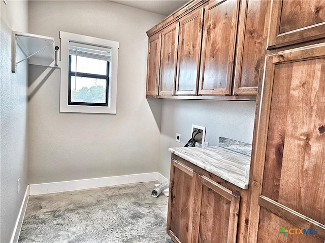 washroom with cabinets, hookup for a washing machine, light colored carpet, and electric dryer hookup