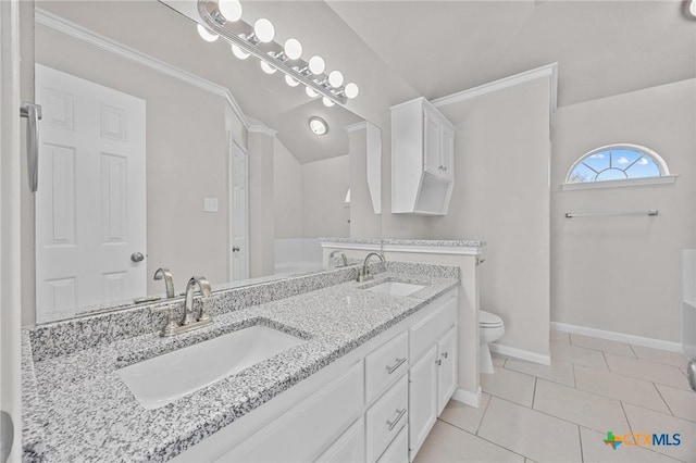 full bathroom with baseboards, a sink, toilet, and tile patterned floors