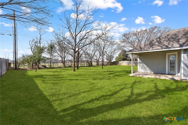 view of yard with fence