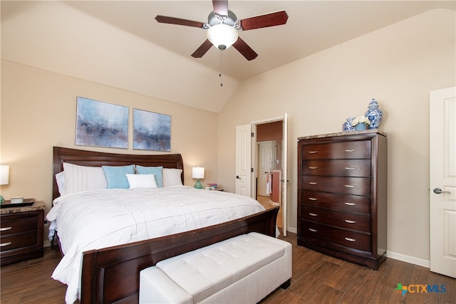 bedroom featuring lofted ceiling, dark hardwood / wood-style floors, and ceiling fan