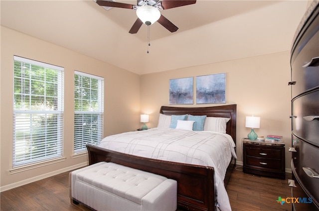 bedroom featuring ceiling fan and dark hardwood / wood-style floors