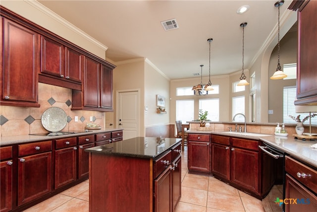 kitchen with a center island, black appliances, sink, ornamental molding, and pendant lighting