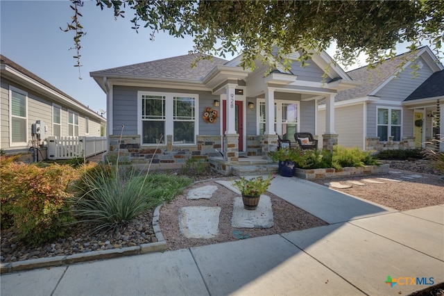 craftsman-style home featuring covered porch