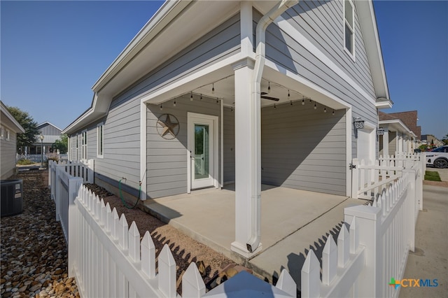 view of side of property with cooling unit