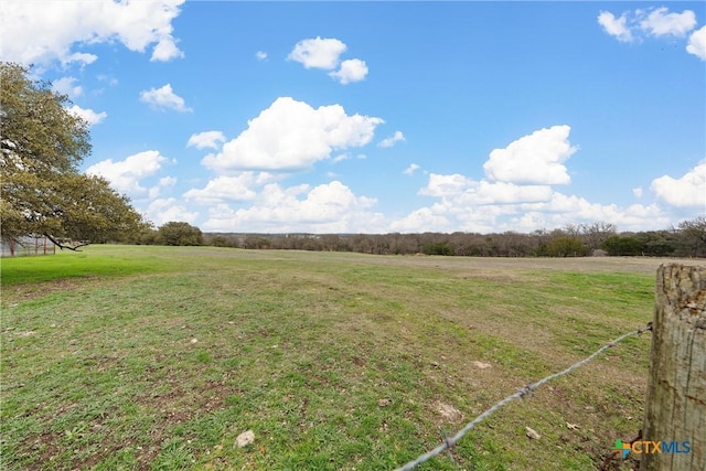 view of yard featuring a rural view