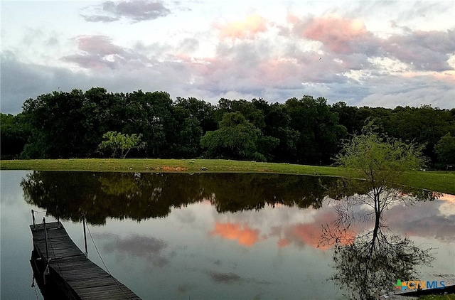 view of dock with a water view