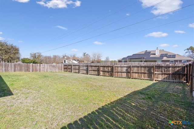 view of yard featuring a fenced backyard