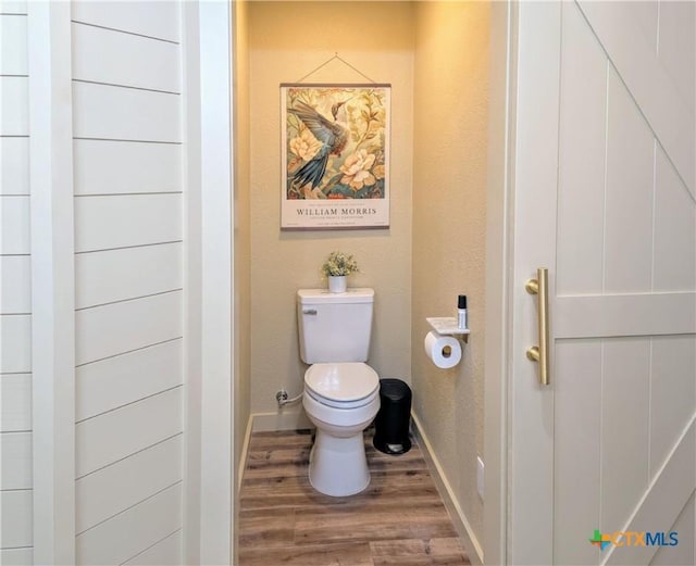 4770 Fm 2808, Kempner, TX 76539 - bathroom with wood finished floors, baseboards, and toilet