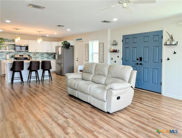 4770 Fm 2808, Kempner, TX 76539 - living area with ceiling fan, recessed lighting, and light wood-type flooring