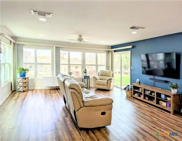 4770 Fm 2808, Kempner, TX 76539 - living area with wood finished floors, ceiling fan, baseboards, and recessed lighting