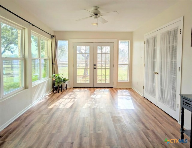 4770 Fm 2808, Kempner, TX 76539 - unfurnished sunroom featuring french doors, baseboards, and wood finished floors
