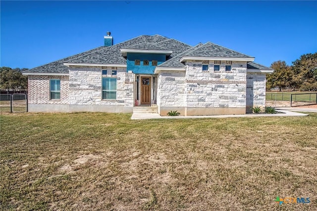 view of front of property with a front yard