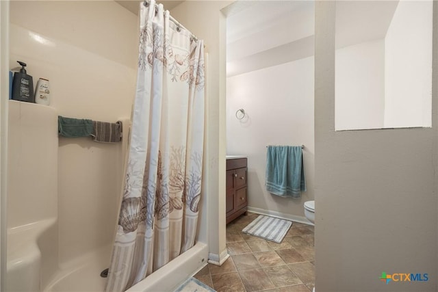 1215 Amanda, Canyon Lake, TX 78133 - full bath featuring toilet, vanity, a shower with shower curtain, and baseboards