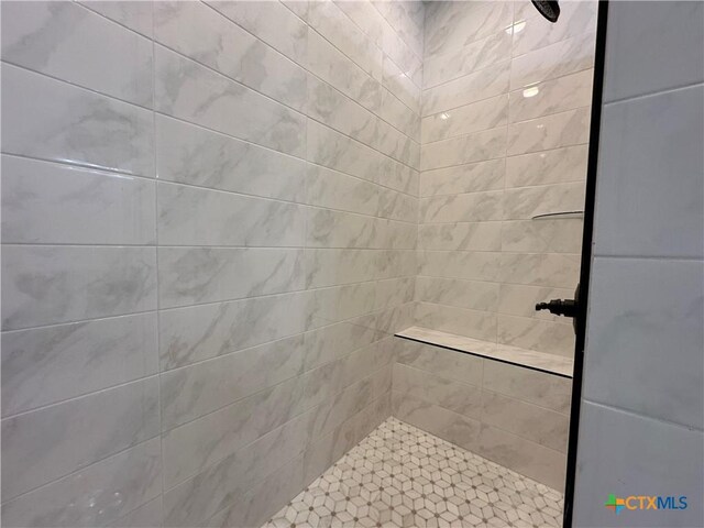 full bathroom featuring hardwood / wood-style flooring, vanity, toilet, and tiled shower / bath combo