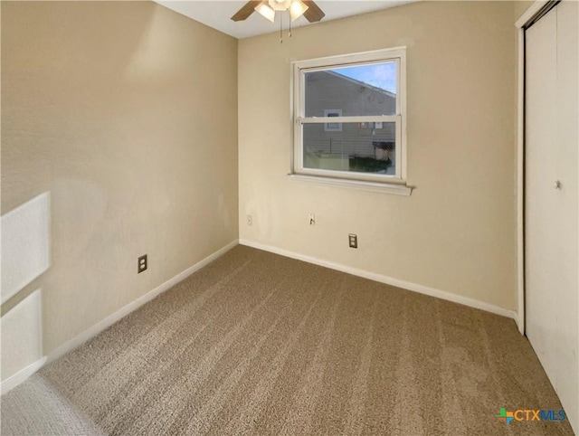 unfurnished bedroom with carpet floors, a closet, and ceiling fan