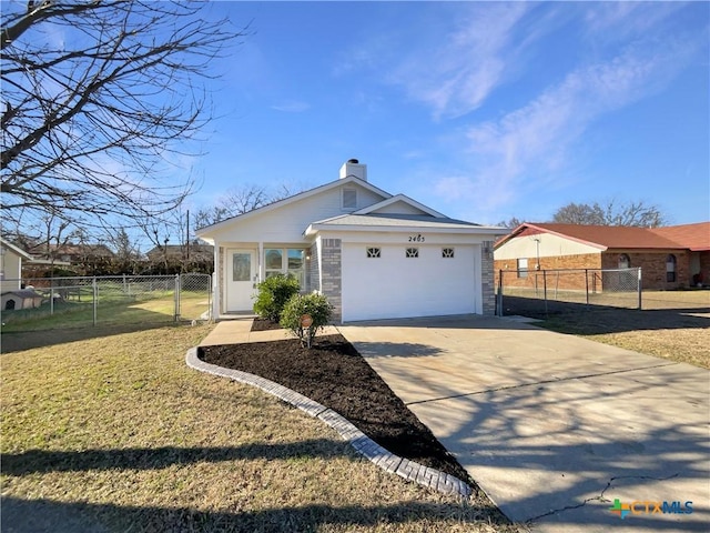 ranch-style home featuring a garage and a front yard