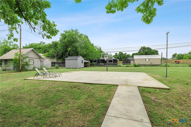 8704 Trailridge Dr, Temple, TX 76502 - view of yard with a storage unit and a patio area