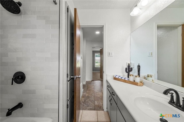 8704 Trailridge Dr, Temple, TX 76502 - bathroom featuring tiled shower and vanity