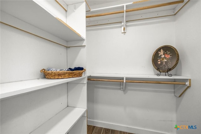 8704 Trailridge Dr, Temple, TX 76502 - spacious closet with wood finished floors