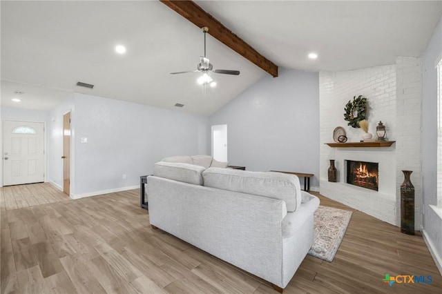 8704 Trailridge Dr, Temple, TX 76502 - living area featuring ceiling fan, a brick fireplace, wood finished floors, and recessed lighting