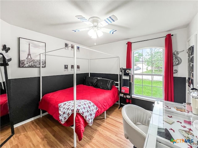 144 Calcite Ln, Jarrell, TX 76537 - bedroom with wood finished floors and ceiling fan
