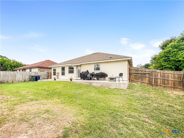 144 Calcite Ln, Jarrell, TX 76537 - back of house with a patio