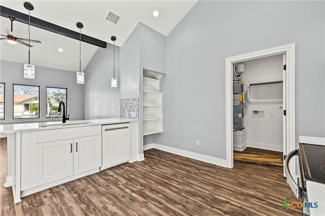 kitchen featuring dishwasher, dark wood-style flooring, a sink, and visible vents