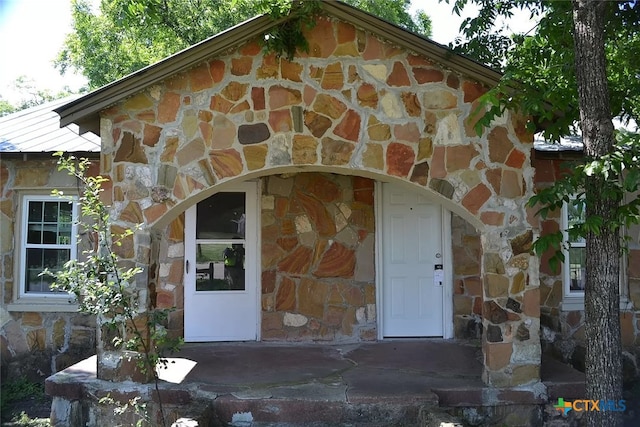 408 E N Ave, Lampasas, TX 76550 - property entrance featuring stone siding