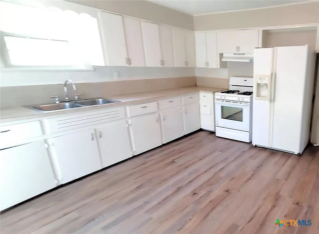 kitchen featuring light hardwood / wood-style flooring, white appliances, sink, and white cabinets