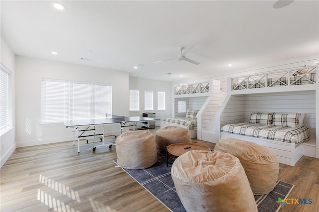 interior space featuring ceiling fan and hardwood / wood-style flooring